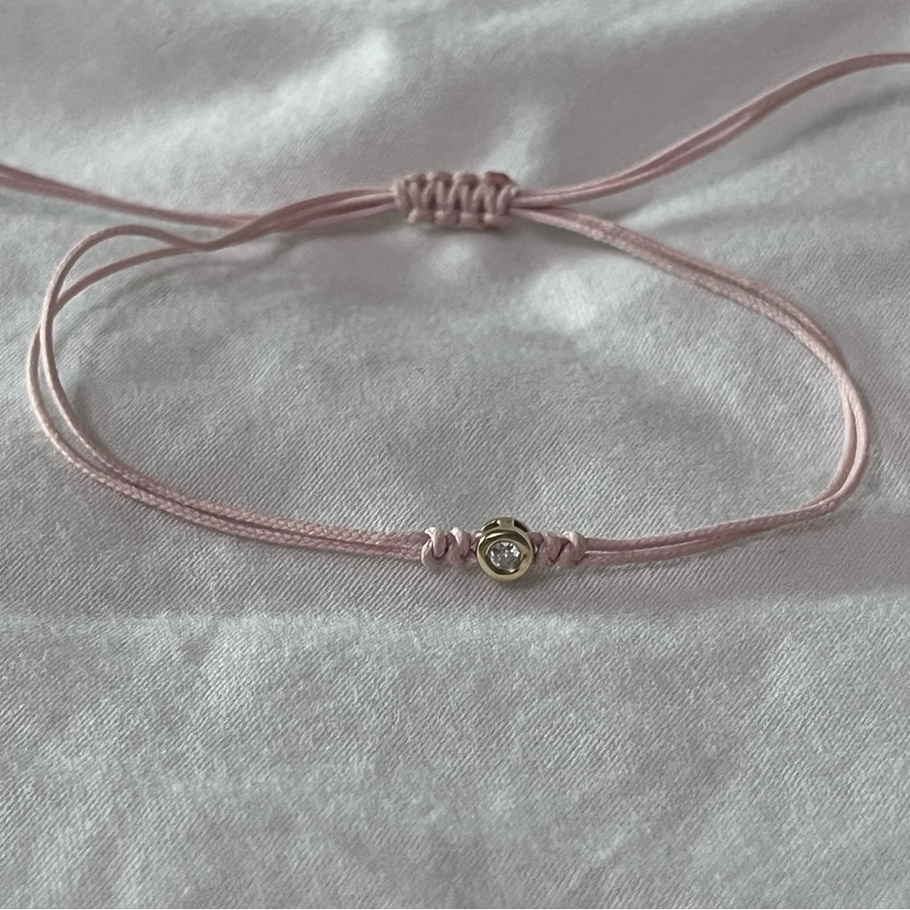 String bracelet with tiny diamond